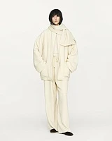 Ivory textured wool fringed straight pants