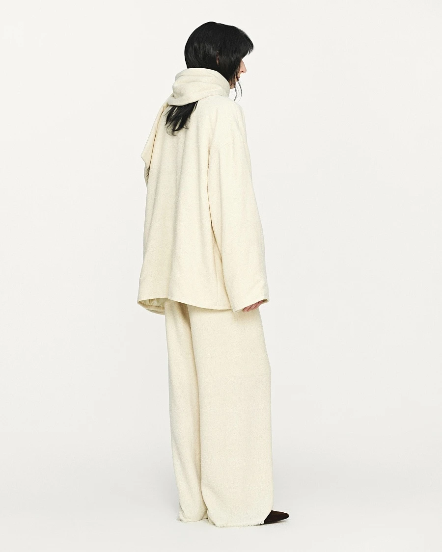 Ivory textured wool fringed straight pants